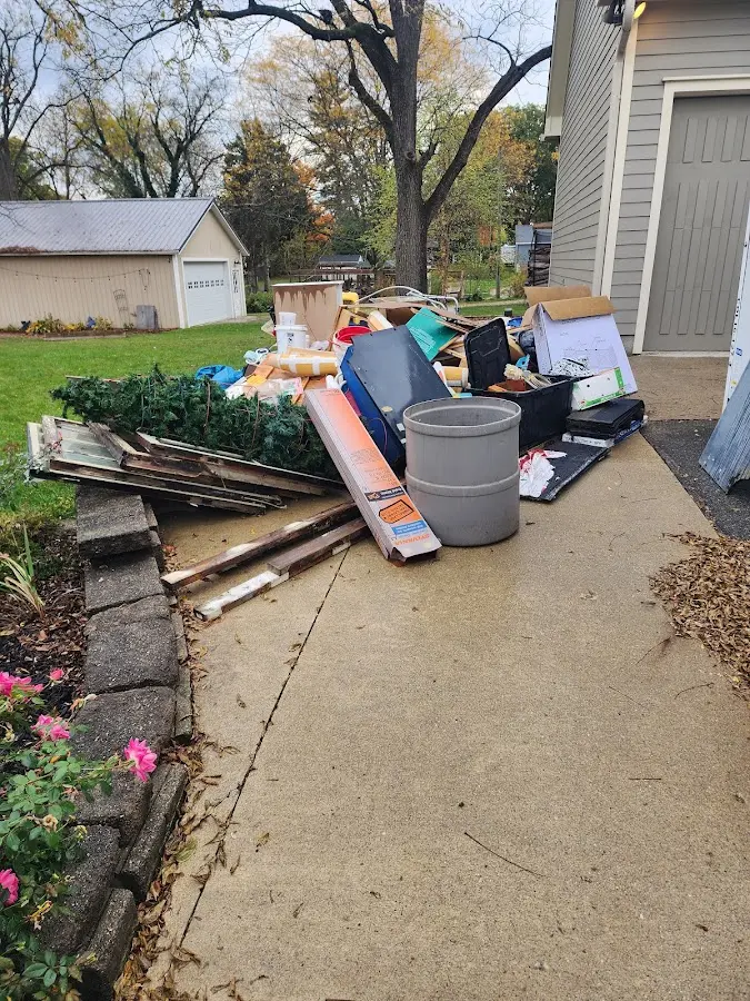 Dumpster being loaded with debris for 30 Yard Dumpster Rental in Nyack